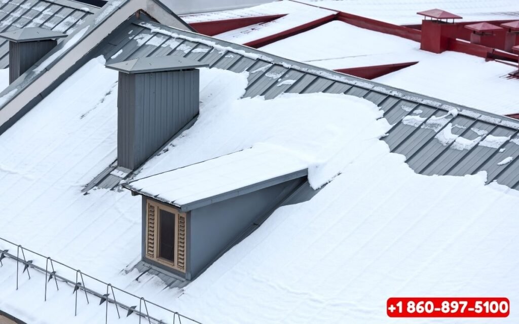 Lcm Services LLC team removing snow from roof in Waterbury