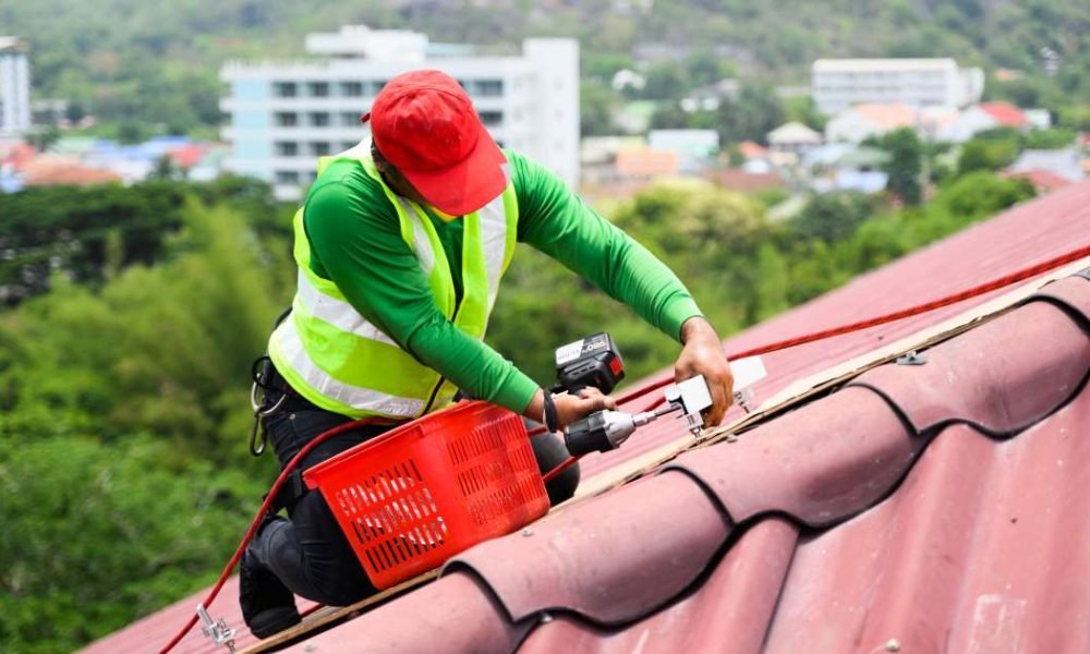 professional-engineer-worker-installing-solar-pane-2023-11-27-05-28-15-utc (1)